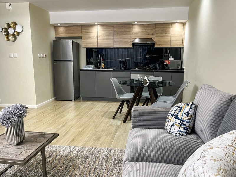 The Elara — living and dining, wide