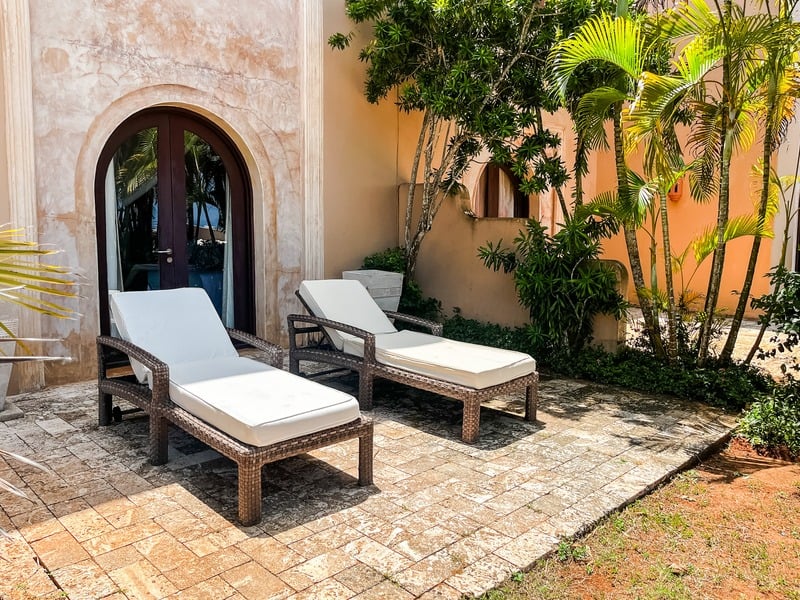 The Maridi Villa — garden lounge, arched entry at ground level