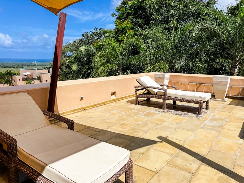 The Maridi Villa — rooftop terrace with sun loungers