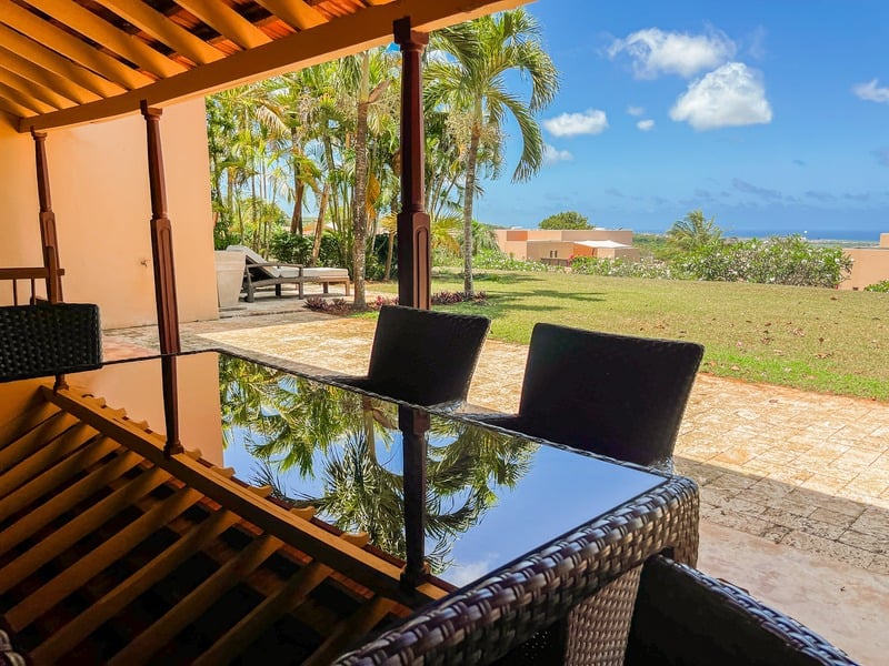 The Maridi Villa — pergola terrace looking over the lawn